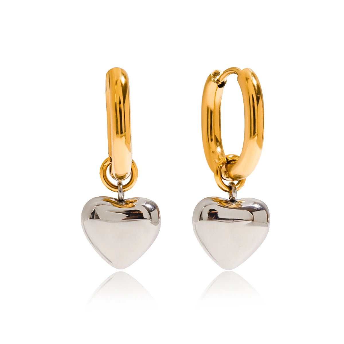 Gold hoop earrings with heart-shaped charms on a white background